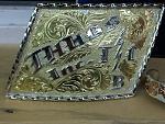 Western style belt buckle and sterling jewelry